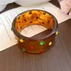 Pulseira Elástica Exótica Dourado Antigo_ Vintage para Mulheres, Fashionável e Única, Joia de Mão Exagerada, Pulseira com Toque de Nicho de Luxo