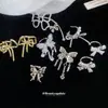 Pinza para Oreja Super Hada con Moño de Circonita, Exquisita y Elegante, de Moda para el Viaje Diario, Lujo Ligero, Sensación de Alta Gama, Joyería para Orejas sin Perforación