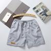 Pantalones de tres puntos para hombre, pantalones de playa de verano, pantalones casuales de color caramelo, pantalones cortos deportivos, pantalones cortos de moda para hombre, venta al por mayor