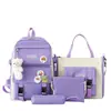 Mochila de cuatro piezas al por mayor mochila de cinco piezas de gran capacidad traje estilo Harajuku coreano mochila escolar para estudiante