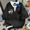 Camiseta de algodón 100% puro, marca de moda popular, diseño falso de dos piezas, cuello redondo, manga corta, para hombres y mujeres, top de verano holgado, corte ajustado, estilo Ins