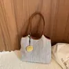 Nova Bolsa de Ombro Tecida 2026 para Mulheres, Bolsa Saco Versátil e Fashion, Bolsa Transversal de Palha, Bolsa de Mão com Design de Nicho