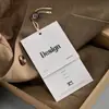 Etiquetas de ropa de alta gama hechas a medida para hombre y mujer, etiquetas con logo personalizado, etiquetas colgantes para ropa de cinta gruesa de marca de moda moderna, personalización