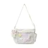 Nova bolsa de ombro transparente versátil estilo japonês para escola, bolsa casual de grande capacidade para mulheres, adequada para carregar livros e itens em estilo 2D
