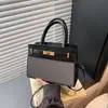 Bolsa Nova Primavera 2026 Simples e Estilosa Bolsa de Ombro Único Casual Simples Retro Color-Block Transversal Bolsa Feminina