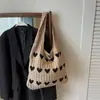 Bolsa de Lã Feminina 2025 Nova Moda Bolsa de Axila Tricotada à Mão Bolsa de Ombro de Nicho Bolsa Tote para Roupas de Trabalho