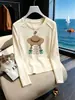 Elegante camiseta de manga larga ajustada para mujer, nuevo modelo otoño 2026, simple y chic, versátil, color albaricoque, top de algodón puro