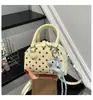Bolsa de Bowling de Bolinhas Estilo Coreano para Mulheres Nova Coleção Primavera/Verão 2026 Bolsa de Mão de Nicho Bolsa Transversal Bolsa de Ombro de Alta Qualidade para o Dia a Dia