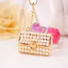 Cool Hee joyería bolso de mano con cadena de perlas para mujer llavero de novia llavero con colgante de metal pequeño regalo 264
