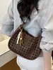 Moderna Bolso Cubo Grande Nuevo para Mujer 2026 Estilo Coreano Hueco Bolso de Hombro Único Versátil Bolso Cruzado para el Viaje Diario