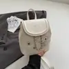 Bolsa Feminina 2025 Verão Novo Estilo Simples Estilo Coreano Faculdade Versátil Mochila Corrente Moda Bolsa para o Dia a Dia Atacado