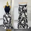 Saia Elegante Plissada Estampada de Comprimento Médio de Cintura Alta Emagrecedora Evasê com Cintura Elástica Estilo Social Europeu e Americano Saia Evasê para o Verão