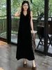 Vestido negro sin mangas estilo Hepburn francés para mujer, vestido largo de otoño con cuello en V y retazos de encaje, vestido tipo chaleco de alta gama, moderno