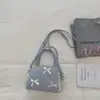 Bolsa Xadrez com Bolinhas Casual da Moda para Mulheres 2026 Nova Versátil Bolsa Transversal Moda Bolsa de Ombro Sob o Braço