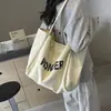 Bolsa Casual de Lona Feminina Grande Capacidade 2024 Nova Chegada Verão Combina com Tudo Bolsa de Ombro para Compras Classe Trabalho Tote Bag