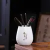 Ceremonia del Té de Porcelana de Jade Seis Caballeros Cerámica Dehua Accesorios de Té Kung Fu Madera de Sándalo Negra China Pinza para Té Pluma de Té Juego de Té