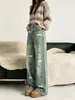 Pantalones vaqueros bordados de estilo coreano para mujer, con corte recto, cintura alta y efecto adelgazante, diseñados para otoño e invierno 2026, con una caída elegante y silueta de pierna ancha.