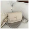 Bolso de mano de alta gama, de nicho, con lazo para mujer, nuevo bolso cruzado de moda 2026, bolso de hombro cuadrado pequeño elegante y versátil para mujer
