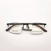 Venta al por mayor 88019, gafas de media montura informales de negocios para hombre, montura ultraligera de titanio semi, acero plástico, patillas súper elásticas y resistentes.