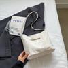 Bolso pequeño sencillo de estilo occidental para mujer, novedad de verano 2024, bolso de hombro bajo el brazo, bolso informal de tela combinable para ir al trabajo.