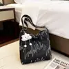 Bolso bandolera bordado de colores estilo coreano para mujer, bolso de mano de gran capacidad para estudiantes para la escuela y el trabajo, bolso de hombro ligero y elegante