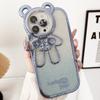 Funda de Teléfono Apple 17Promax con Purpurina Galvanizada iPhone16 Oso de la Suerte con Soporte 15 Correa de Dibujos Animados 14 Funda Suave