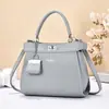 Bolso de Diseño Nicho para Mujer 2025 Nuevo Bolso de Mano de Textura de Alta Gama para Viajes Cotidianos Gran Capacidad Bandolera Cruzada Bolso Gatito