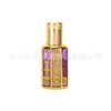 Frasco octogonal de vidro com relevo dourado para óleos essenciais, frasco de sérum roll-on requintado do Oriente Médio, frasco dispensador de perfume de múltiplas especificações, frasco de amostra