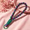 Correas de muñeca tejidas a mano de colores para teléfono de comercio exterior, disponibles en varios colores, llaveros, colgantes para bolsos y botellas de agua, venta al por mayor desde el fabricante