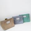 Bolsa de cosméticos de lona de pana pequeña fresca de gran capacidad portátil color sólido almacenamiento simple clutch cosmético al por mayor