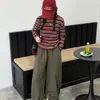 Conjunto de Camisetas para Meninas Outono 2026, Novo Conjunto de Duas Peças Elegante com Top de Manga Longa Listrado e Calças Casuais, Transfronteiriço