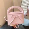 Bolso de mano de lazo simple transfronterizo para mujer, nuevo y elegante 2026, versátil, de alta gama, para hombro y cruzado