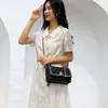 Agente de Compras de Hong Kong 2025 Bolso de Mano para Mujer de Cuero Genuino Nuevo, de Nicho, Gama Alta, Elegante, Bolso Pequeño Cruzado con Textura Versátil