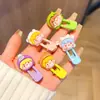 Puesto de网红 mercado nocturno patrón de un dólar accesorios para el cabello pinza para el cabello al por mayor tocado de dibujos animados tocado cuerda puesto de joyería pinza para el cabello mercancía