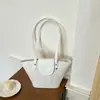 Bolsa de Mão de Nicho de Luxo Feminina 2026 Nova Moda Textura Trançada Bolsa Cesta de Piquenique Bolsa Tote Casual para o Dia a Dia