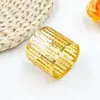 Venda Quente Transfronteiriça Estilo Minimalista Dourado Cilíndrico Vazado Padrão Martelado Anel de Guardanapo de Metal Fabricante de Anel de Guardanapo Atacado