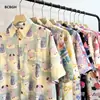 Camisetas de Manga Corta Divertidas con Dibujos Animados y Graffiti Estilo Hong Kong Veranieño para Hombres y Mujeres Estilo Dopamina Sueltas Dulces Florales Camisas Modernas
