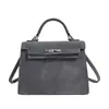 Bolsa de Felpa de Gamuza de Nicho para Otoño e Invierno para Mujer 2026 Nueva Bolso Cruzado Versátil Retro Exquisito Mini Bolso Kelly