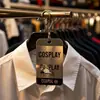Etiquetas colgantes de papel kraft con patrón de billetes antiguos, Etiquetas de papel promocionales colgantes con impresión digital de descuento para tienda de ropa