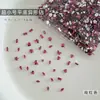 Mini pedrería para uñas de fondo plano y forma única, incluyendo diseños de corazón, ojo de caballo y mariposa, para decoración y embellecimiento de uñas; un producto popular transfronterizo