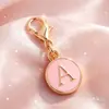 Accesorios para joyería DIY 26 letras inglesas broche de langosta colgante redondo de esmalte de doble cara