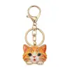 Colgante de gato de dibujos animados de moda más vendido, cabeza de gato simulada con diamantes, llavero, regalo para novias, llavero de decoración para coche