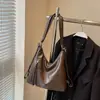 Produto Novo da Moda Transfronteiriço, Design de Nicho, Textura de Couro Macio, Bolsa de Ombro para Axila, Versátil para o Dia a Dia, Mochila Simples para Mulheres
