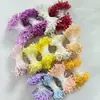 Grampo de cabelo floral feito à mão com estames de flor foscos de 2 mm. Materiais: flores artificiais, flores de cipó de papel, flores de seda, cores de flor de cabeça de fósforo.