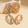 Pendientes Europeos y Americanos Transfronterizos de Brillo Metálico con Forma de Gota de Agua, Estilo Minimalista Único, Pendientes de Temperamento de Nicho de Alta Gama