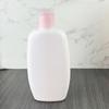 Venta directa de fábrica, botella plana de 24 dientes de 200 ml, color rosa, Johnson &amp; Johnson, loción hidratante, loción corporal, aceite esencial, HDPE, embalaje diario.