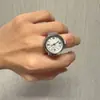 Puede ir a ver la tendencia del anillo en la versión coreana de los accesorios de moda retro personalidad reloj anillo anillo pulsera hombres