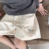 Pantalones casuales para hombre, pantalones cortos deportivos con letras, ropa exterior fina de verano, pantalones anchos y sueltos, pantalones de playa de marca de moda estilo Hong Kong.