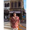 Camisa de estampado completo estilo París francés para hombres y mujeres, unisex, versión coreana, estampado floral maduro, cárdigan con cuello, ropa de playa
