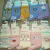 Calcetines de algodón gruesos de punto para bebé, otoño e invierno, altos, holgados, a rayas, con letras de dibujos animados, calcetines para niños, venta al por mayor, envío completo